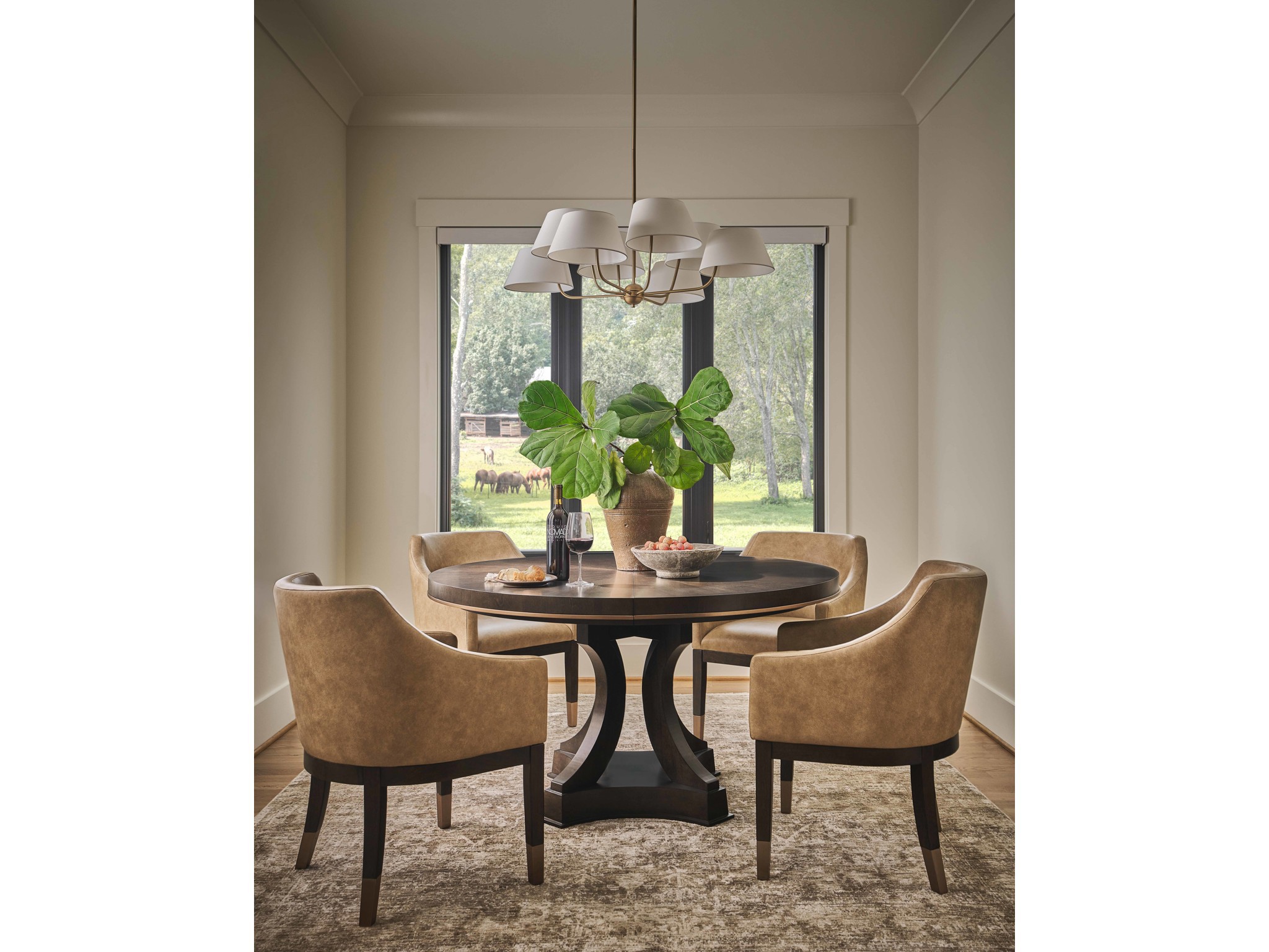 Fenwick Round Dining Table - Multiple item room scene