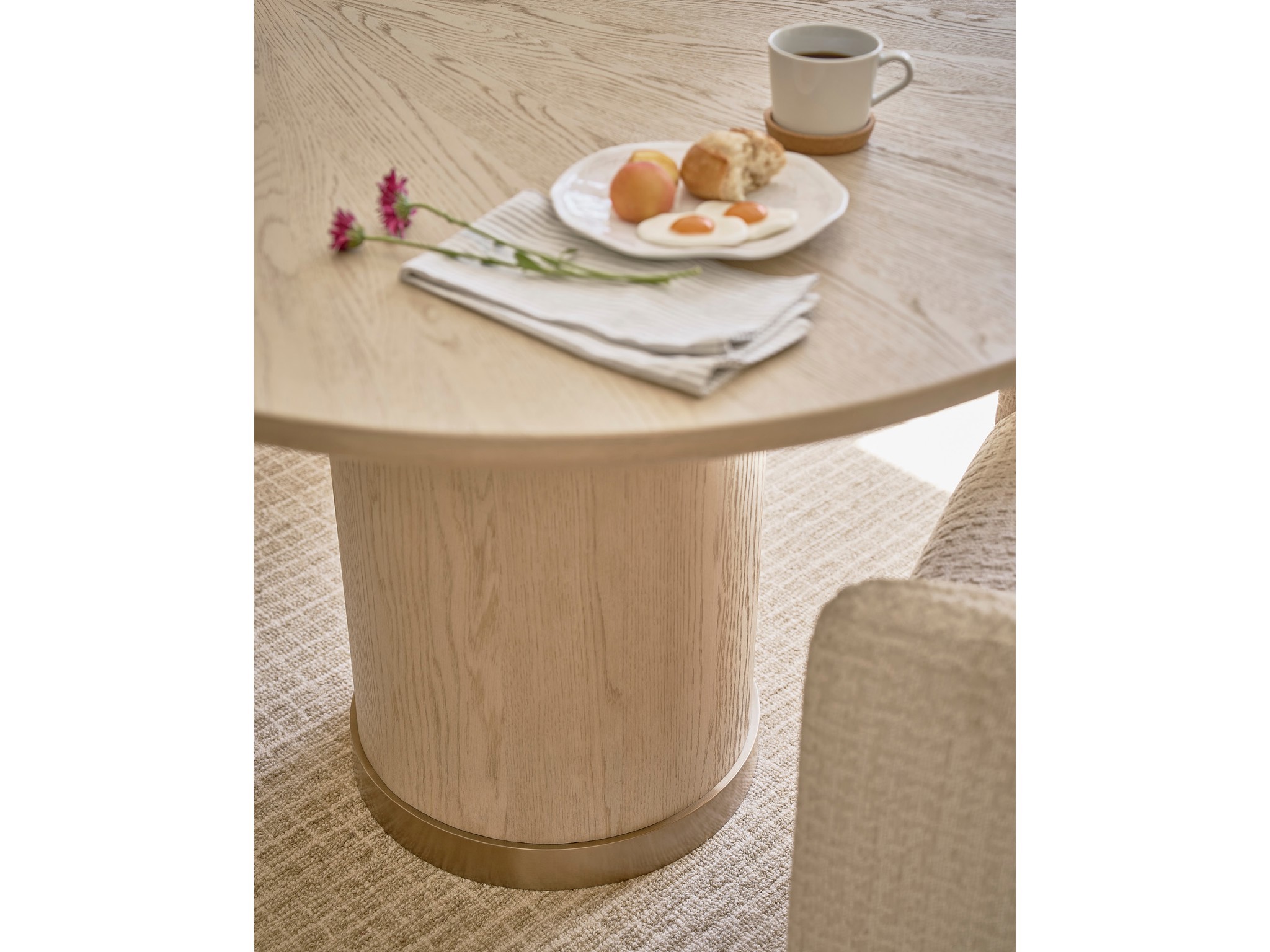 Velora Oval Dining Table - Multiple item room scene