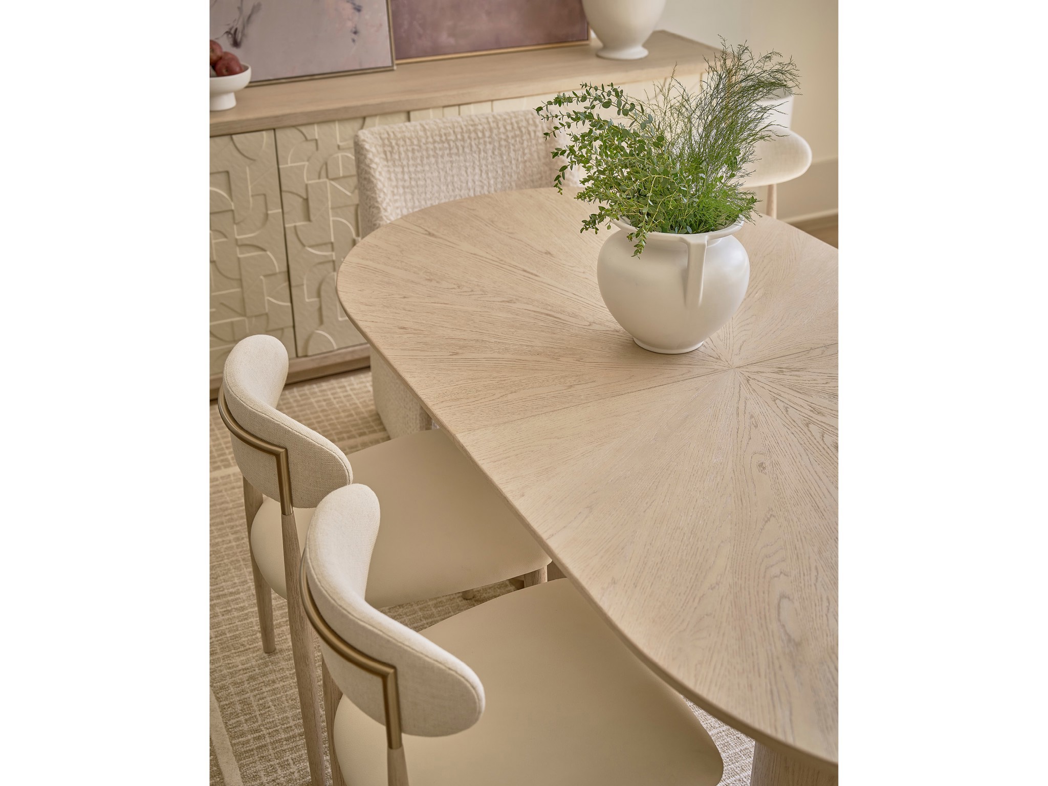 Velora Oval Dining Table - Multiple item room scene
