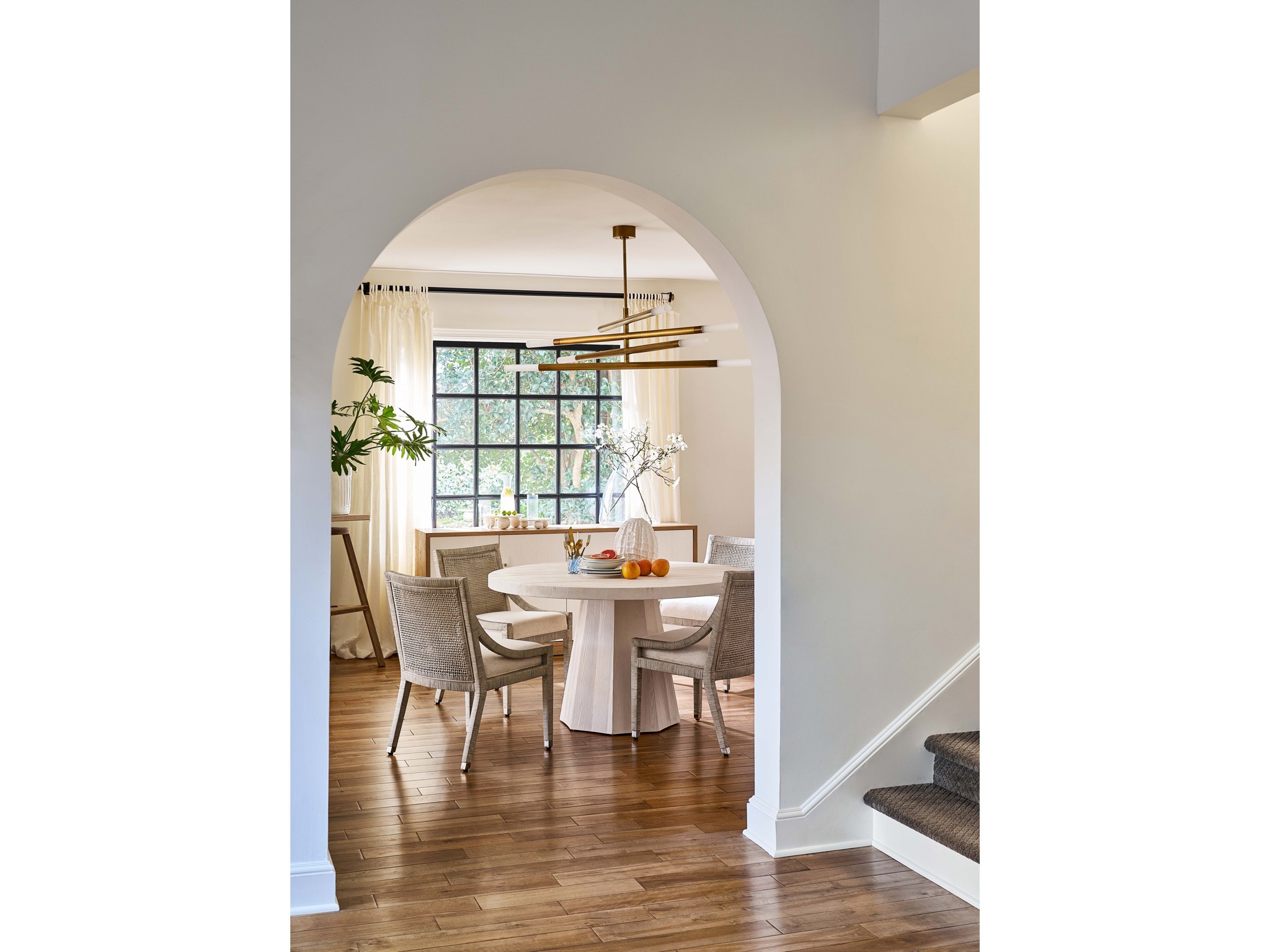 Mackinaw Round Dining Table - Multiple item room scene